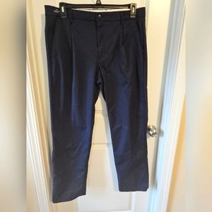 Men's Greg Norman Navy Blue flat front Polyester Spandex golf pants 36x32